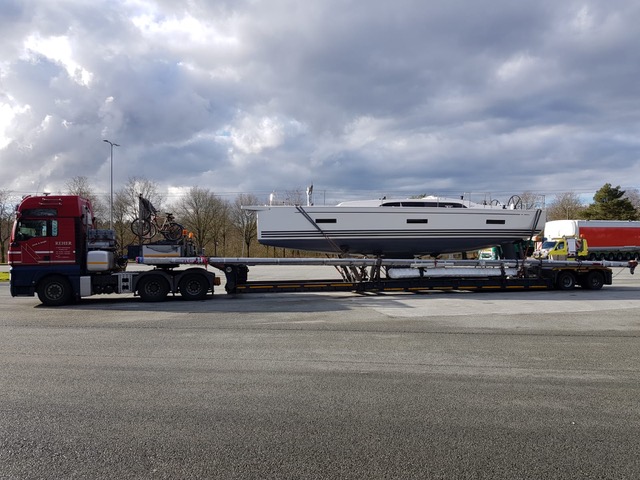 Boats are shipped by trucks 